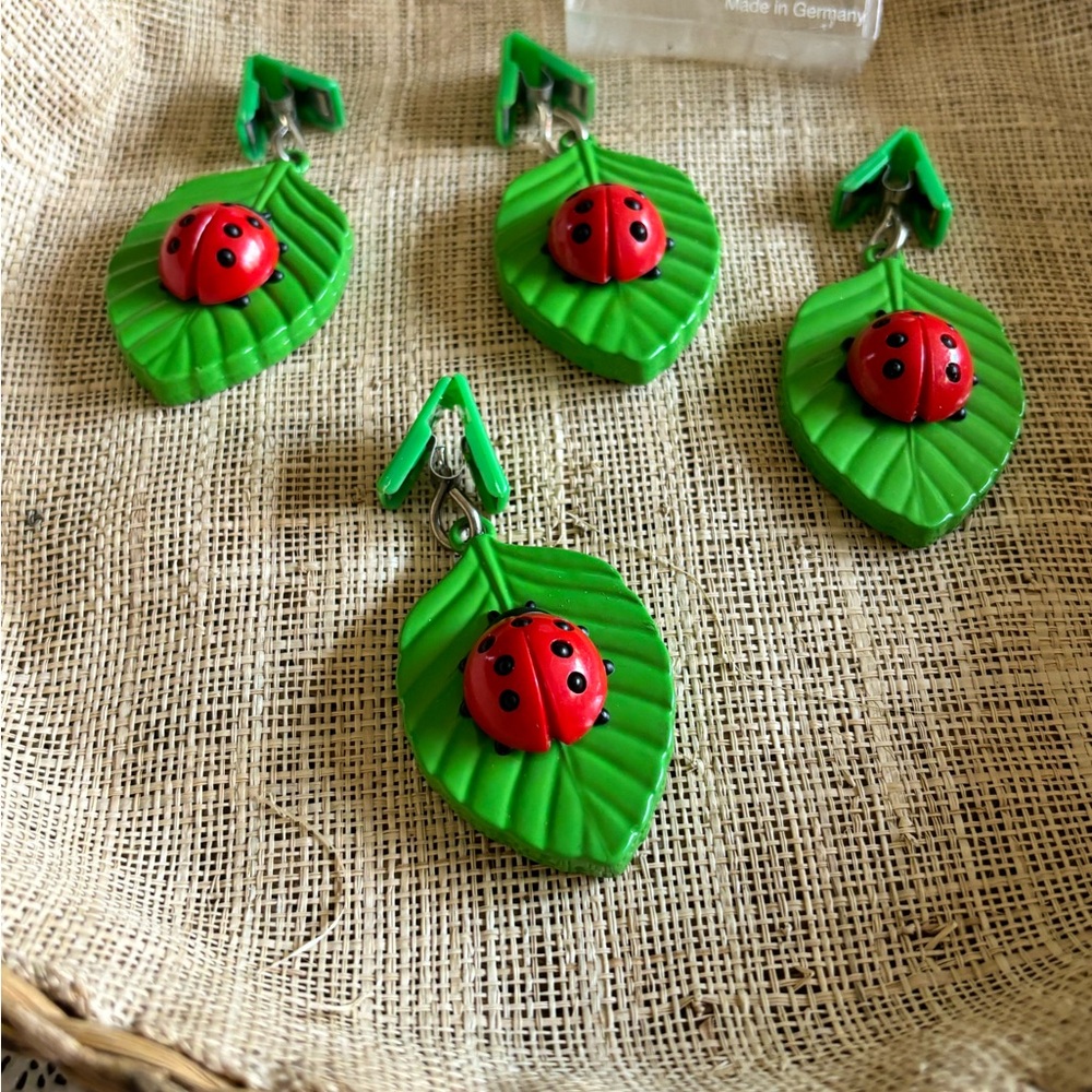 Tablecloth clips,heavy metal leaves with cute little ladybugs. Made in Germany